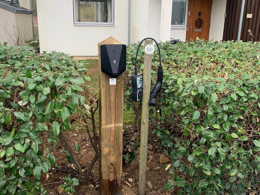 Ev Charger Mounted To Wooden Post